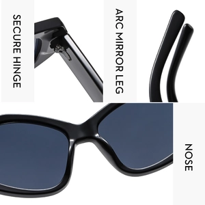 Detail view of secure hinges, arc mirror legs, and nose pads on black sunglasses