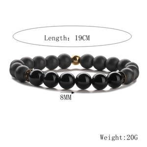 Detail showing 8mm black beaded bracelet dimensions and weight on white background