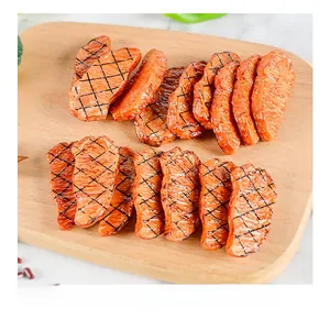 Realistic PVC mini grilled steak models with char marks displayed on a wooden board