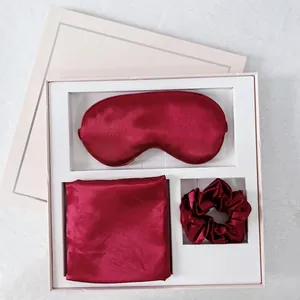 Deep burgundy satin sleep set including eye mask, scrunchie and pillowcase in a gift box