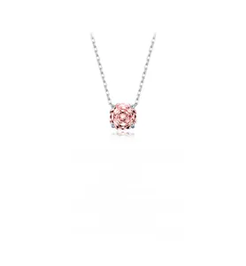 Macro detail of S925 silver necklace with pink octagon gem and floral texture