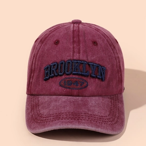 Close-up of vintage washed cotton baseball cap with Brooklyn 1947 3D embroidery detail