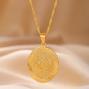 Gold plated oval coin necklace featuring Arabic calligraphy on champagne silk background