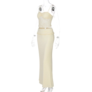 Detailed view of cream lace tube top and matching slim fit skirt on display mannequin