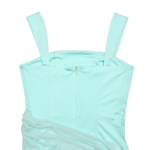 Detail view of mint green dress featuring a back invisible zipper and mesh stitching