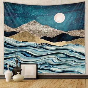 Detail of artistic tapestry with blue starry night, golden mountains and moon patterns