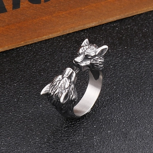 Close-up of retro double wolf head open ring in vintage silver titanium steel