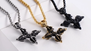 Three-color vajra pillar cross pendants in silver, gold, and black stainless steel