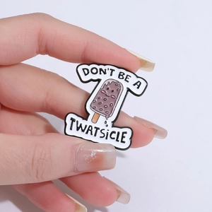 Funny chocolate ice cream metal badge with Don't Be A Twatsicle text for clothing