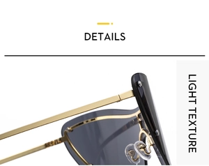 Macro view of gold metal temple connection and gray lens of cat eye rimless sunglasses