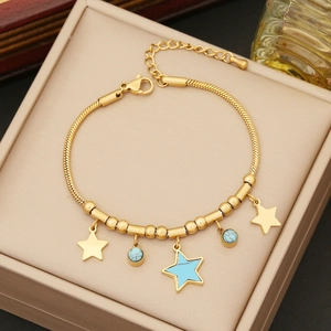 Golden double layer necklace with star pendants and turquoise charms in a gift box