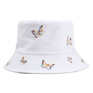 White reversible bucket hat with colorful butterfly embroidery for sun protection