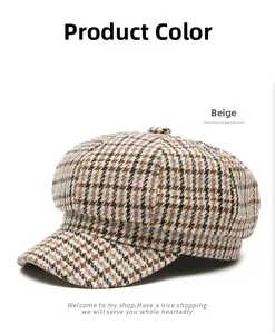 Close-up of the beige plaid texture and thick wool fabric of this vintage octagonal hat