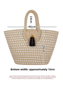 Close-up of woven straw tote bag texture and dimensions 46x29x15cm with striped pattern
