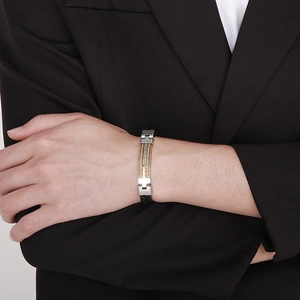 Men's fashion stainless steel cable bracelet with black woven strap on wrist