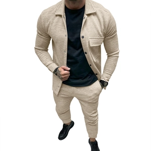 Detail of men's two-piece beige waffle texture jacket and drawstring joggers set