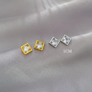 Square zircon stud earrings in gold and silver finish on silk fabric, 1cm minimalist design