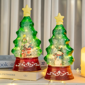 Christmas tree music box snow globe with LED lights and festive Santa Claus miniature