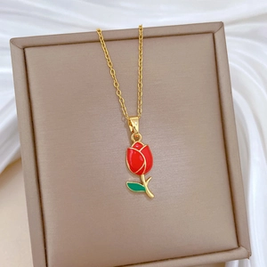 Elegant gold titanium steel necklace featuring a red enamel tulip pendant on white silk
