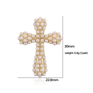 Cross-shaped earrings with inlaid white pearls and size specifications shown on white background