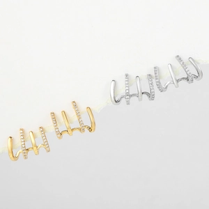 Minimalist four-claw ear cuffs in gold and silver finish with zircon micro-pave