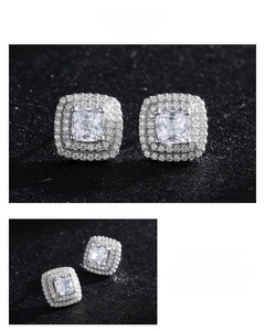 Macro view of square halo cubic zirconia stud earrings in sterling silver from dual angles