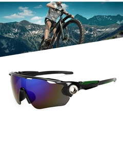 Macro detail of cycling sunglasses with blue-purple gradient lenses and green accents