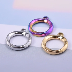 Three-color twisted 304 stainless steel round pendants in silver, gold, and rainbow finish