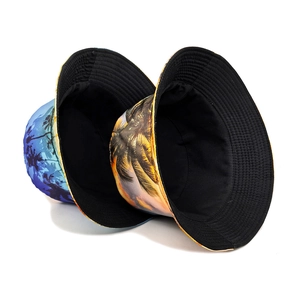 Reversible tropical palm tree print bucket hat with black inner lining for sun protection