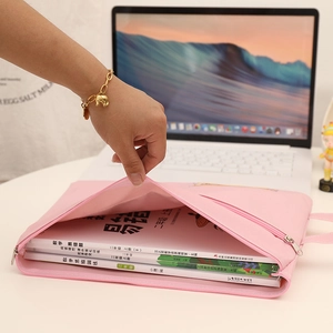 Detail of pink waterproof Oxford A4 file bag showing zipper opening and spacious interior