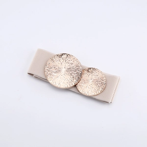 Detail of beige elastic wide belt with golden sunburst double circle metal buckle
