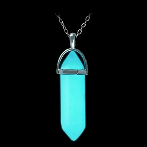 Glow-in-the-dark hexagonal crystal pillar pendant necklace with bright neon blue fluorescence
