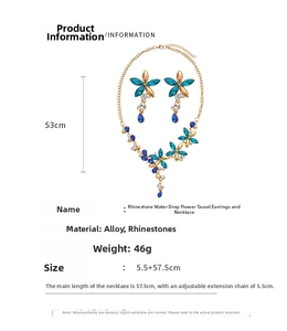 Macro view showing dimensions of vintage crystal flower tassel jewelry set