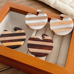 Geometric round resin and wood stitch earrings in natural striped design with silver pins