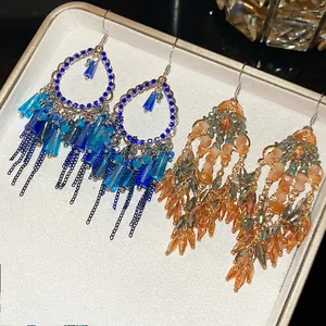 Vintage bohemian drop earrings with crystal beads and long chain tassels in blue and amber