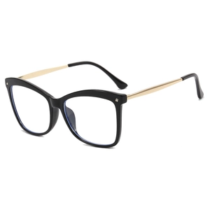 Fashionable black cat-eye glasses with large frame and gold metal temples on white background