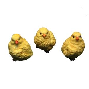 Three cute yellow resin chick figurines for garden landscape and home decoration