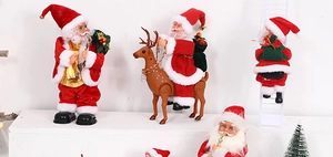 Electric Santa Claus figures climbing a ladder and riding a reindeer for Christmas decor