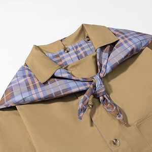 Women's khaki plaid jacket with lapel scarf and amber buttons in 45-degree view