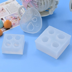 Macro detail of strawberry silicone mold with textured cavities for DIY cake decorating
