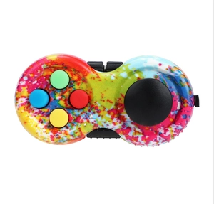 Detailed view of colorful splatter game handle fidget pad with silicone buttons