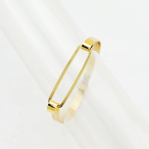 Bracciale da braccio minimalista in rame dorato con un design a cornice cava rettangolare