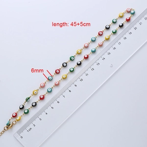 Detail of multi-color Evil Eye necklace with 6mm beads and 45+5cm length measurement