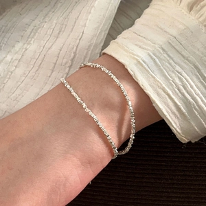 S925 sterling silver crushed silver beads bracelet worn on wrist for a modern look