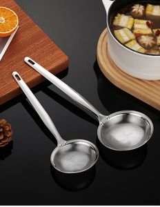Detail of two-piece stainless steel fine mesh oil skimmers with long ergonomic handles