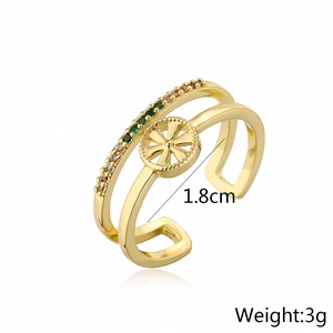 Detailed view of gold plated double layer ring with colored zircons and 1.8cm diameter