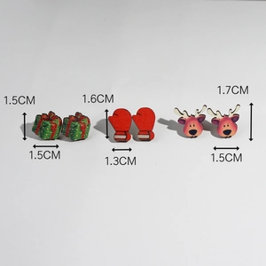 Detail view of Christmas stud earrings set featuring reindeer and glove designs with sizes