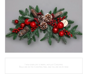 Macro detail of Christmas garland with pine cones, red berries and festive bows