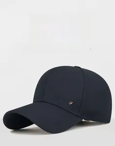 Detailed close-up showing the SPORT embroidery and stitch work on a navy baseball cap