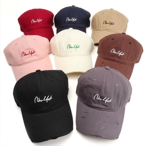 Multiple vintage baseball caps with New York embroidery and distressed brim details
